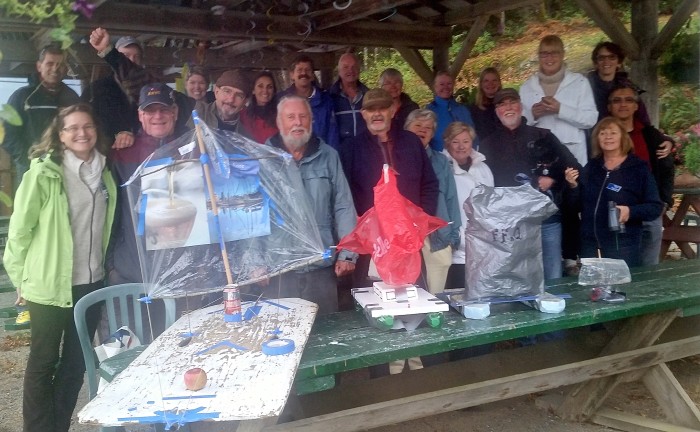 Model boat builders and spectators gather for a group photo prior to the race.
